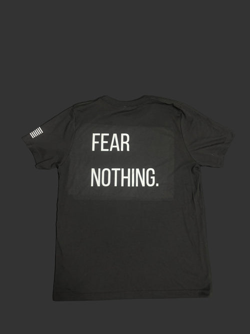 Black t-shirt with 'FEAR NOTHING.' text on a dark background